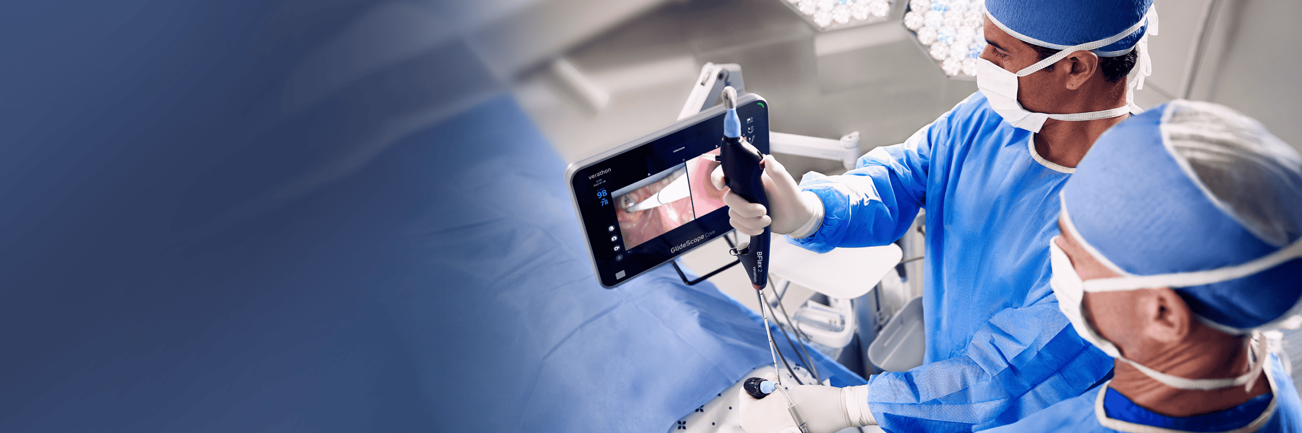 Endoscopic surgical team performing minimally invasive procedure in operating room.