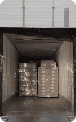 Shipping containers filled with pallets of medical supplies at Canadian Hospital Specialties Ltd.